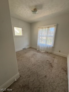 870 Helmsdale Road Cleveland Heights, OH 44112 - Photo 12 of 20 Carpeted spare room with baseboards