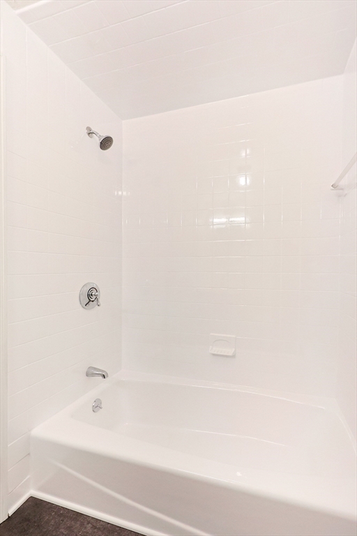 224 School Street, Unit 9 Walpole, MA 02081 - Photo 20 of 31 a bathroom with a bathtub