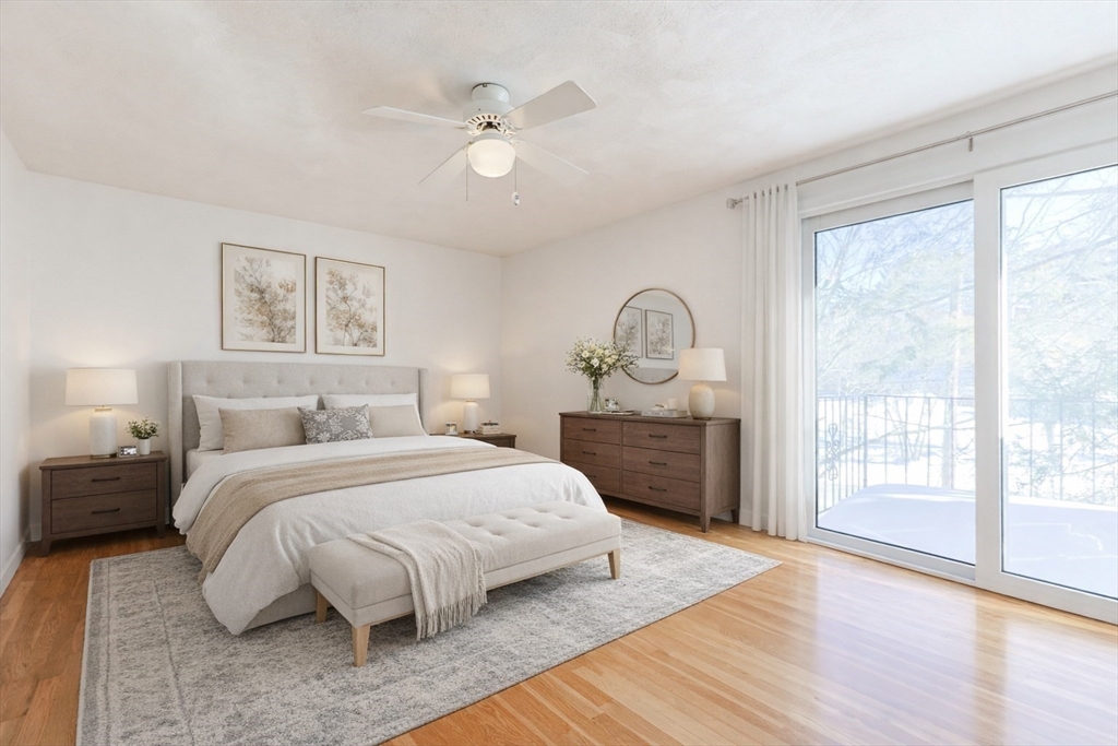 224 School Street, Unit 9 Walpole, MA 02081 - Photo 22 of 31 a spacious bedroom with a large bed and a window