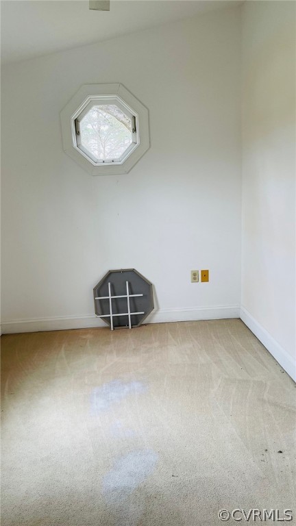 715 Rappahannock Drive White Stone, VA 22578 - Photo 5 of 12 an empty room with a workbench