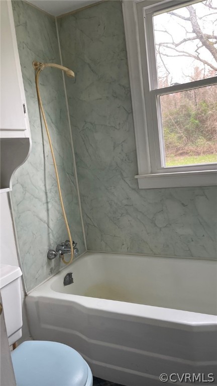 715 Rappahannock Drive White Stone, VA 22578 - Photo 10 of 12 a bathroom with a toilet and a bathtub