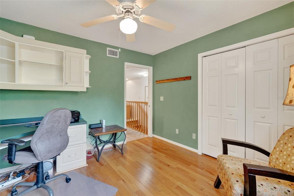 14879 Seminole Trail Seminole, FL 33776 - Photo 16 of 40 a workspace with furniture and a window