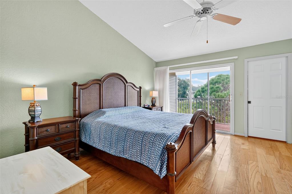 14879 Seminole Trail Seminole, FL 33776 - Photo 19 of 40 a bedroom with a bed and a window