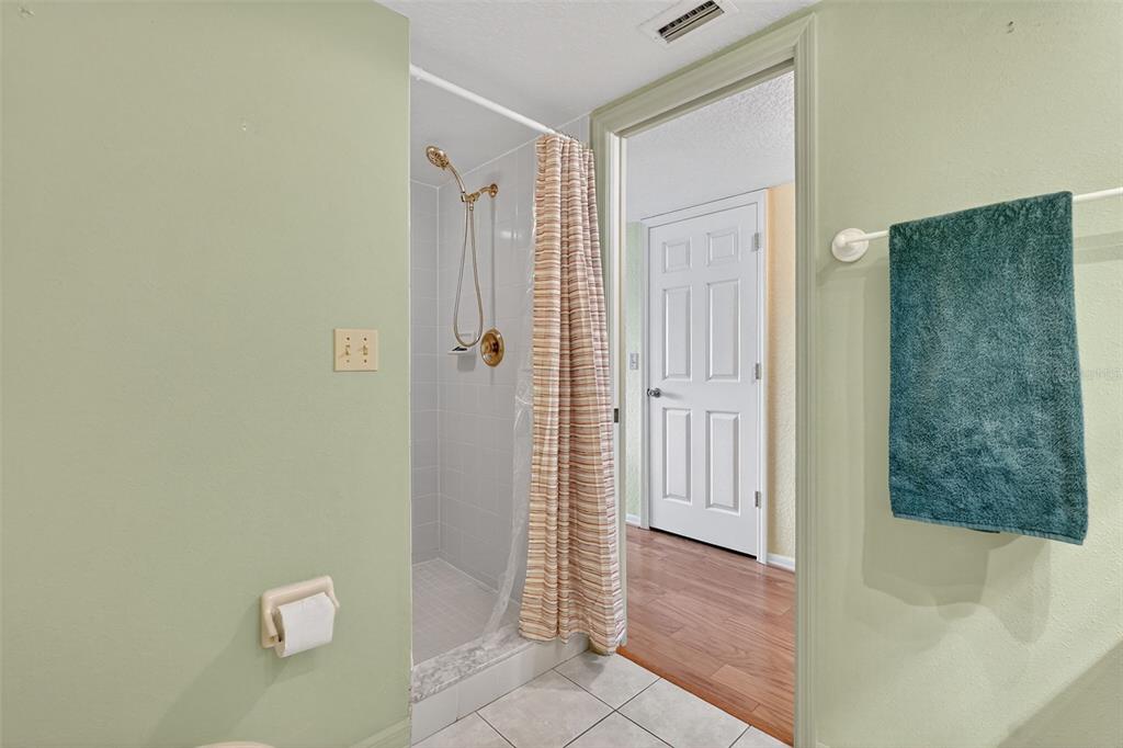 14879 Seminole Trail Seminole, FL 33776 - Photo 23 of 40 a bathroom with a shower