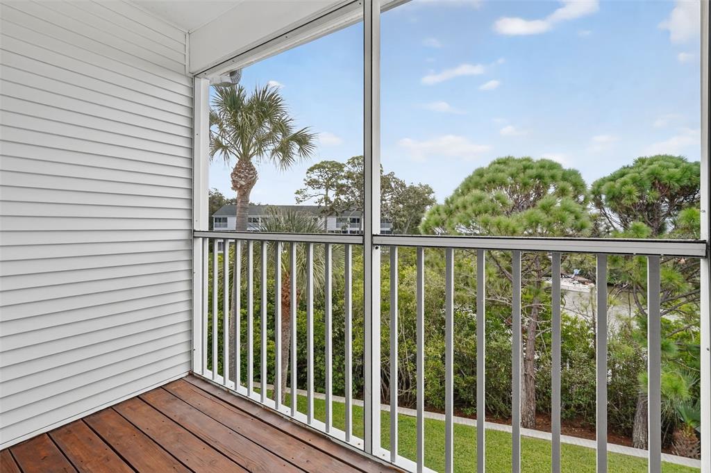 14879 Seminole Trail Seminole, FL 33776 - Photo 24 of 40 a view of a balcony with wooden floor