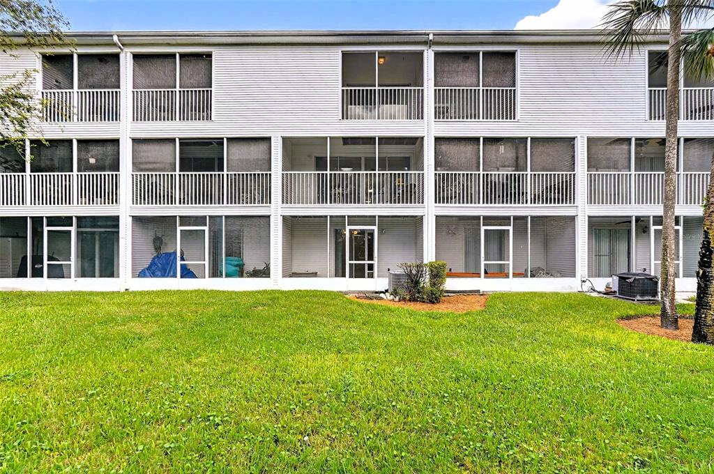 14879 Seminole Trail Seminole, FL 33776 - Photo 33 of 40 a front view of a building with yard and front view of a house