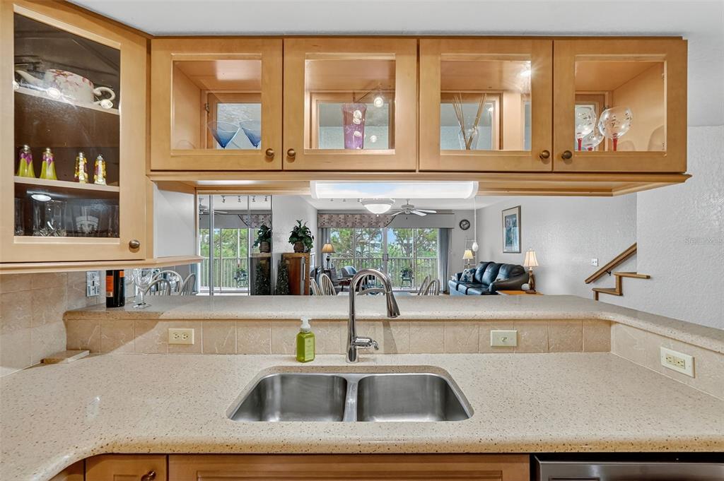 14879 Seminole Trail Seminole, FL 33776 - Photo 7 of 40 a kitchen sink with a granite countertops and a large window