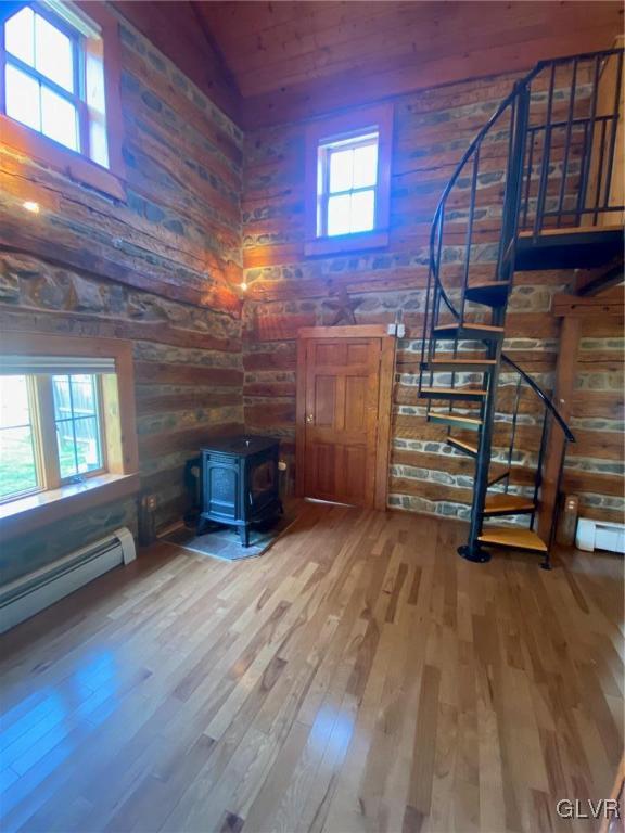 1665 Easton Road Hellertown, PA 18055 - Photo 17 of 37 a view of an empty room with wooden floor fireplace and windows