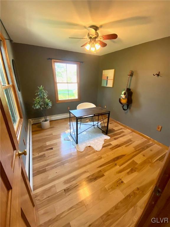 1665 Easton Road Hellertown, PA 18055 - Photo 22 of 37 a bedroom with a bed and a chandelier