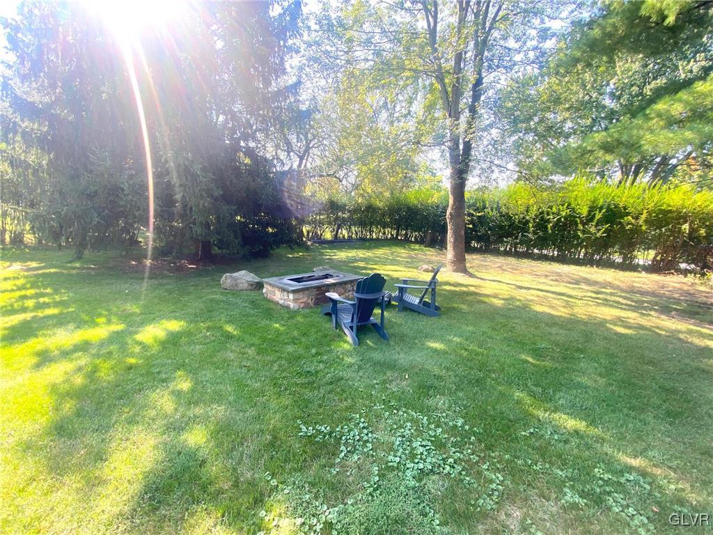 1665 Easton Road Hellertown, PA 18055 - Photo 36 of 37 a swimming pool with outdoor seating and yard