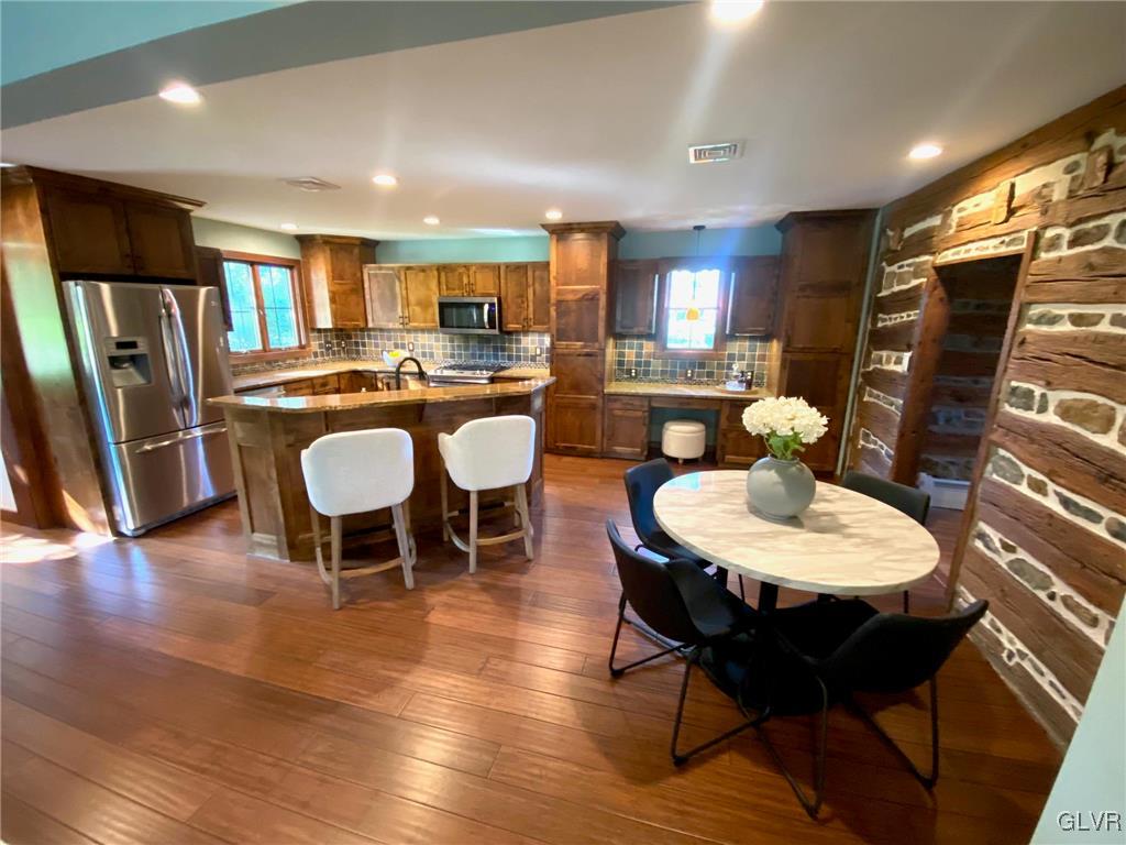 1665 Easton Road Hellertown, PA 18055 - Photo 9 of 37 a view of a dining room with furniture and wooden floor
