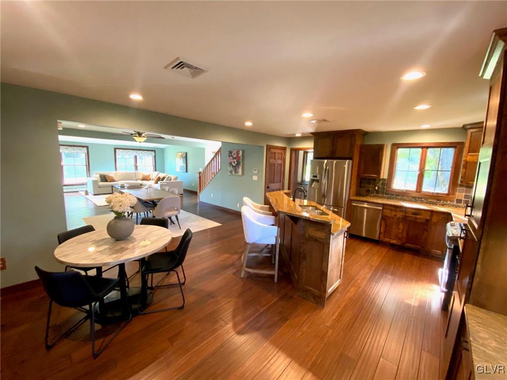 1665 Easton Road Hellertown, PA 18055 - Photo 10 of 37 a living room with furniture and a wooden floor