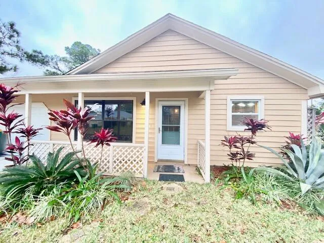 a front view of a house with a patio
