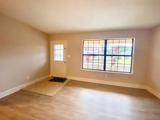 an empty room with windows