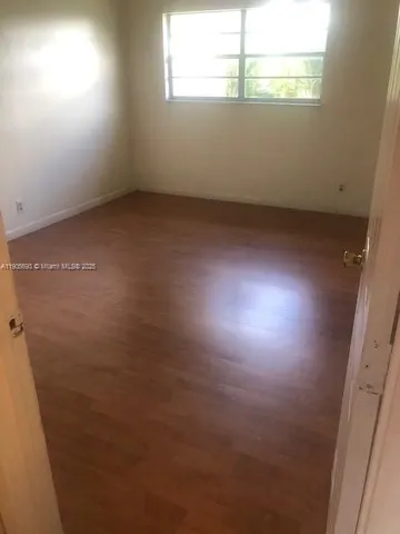 a view of a room with a door