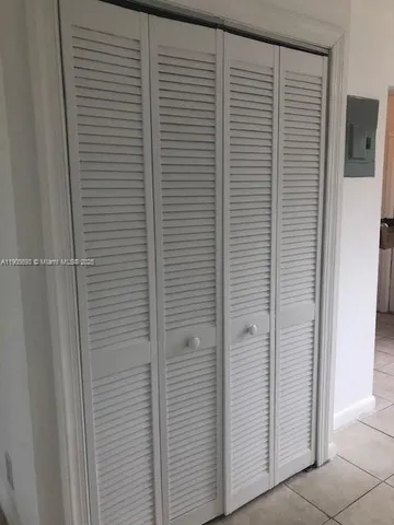 a bathroom with a toilet sink and shower