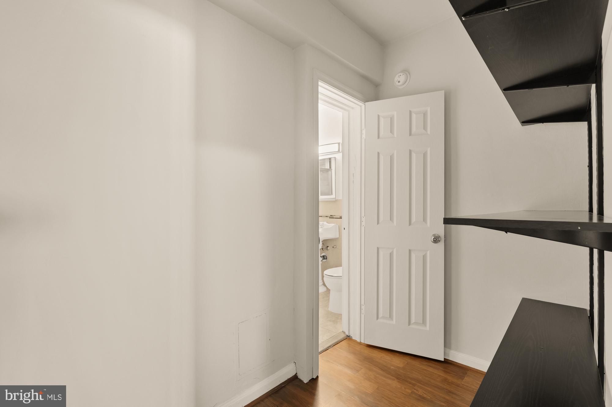1 Scott Circle Northwest, Unit 719 Washington, DC 20036 - Photo 15 of 20 a view of a hallway with wooden floor