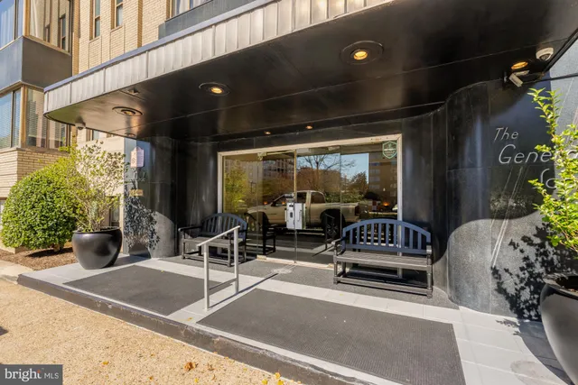 a outdoor living space with furniture and potted plants
