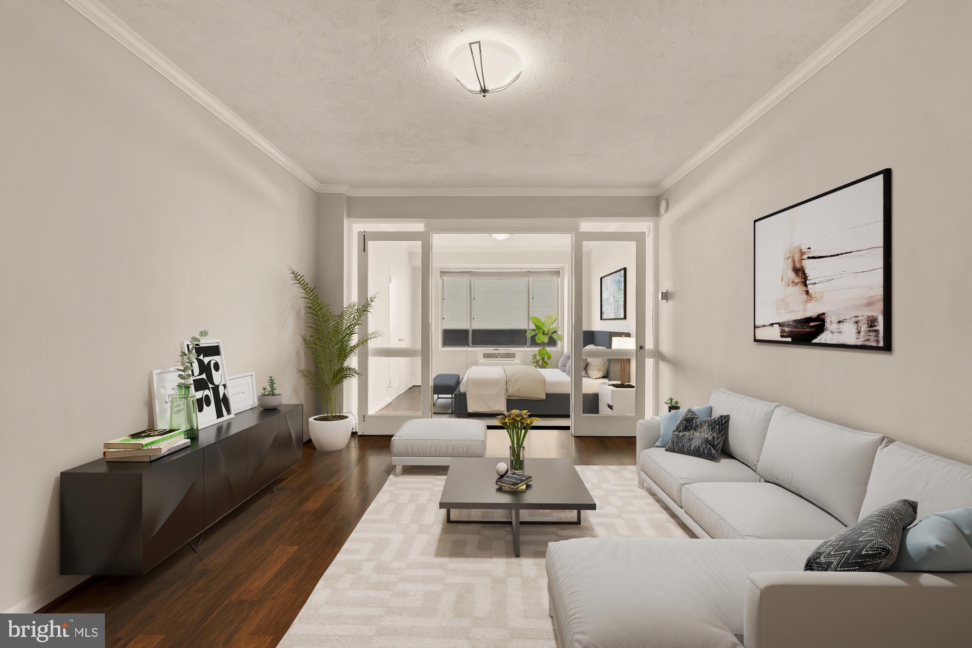 1 Scott Circle Northwest, Unit 719 Washington, DC 20036 - Photo 9 of 20 a living room with furniture wooden floor and a large window