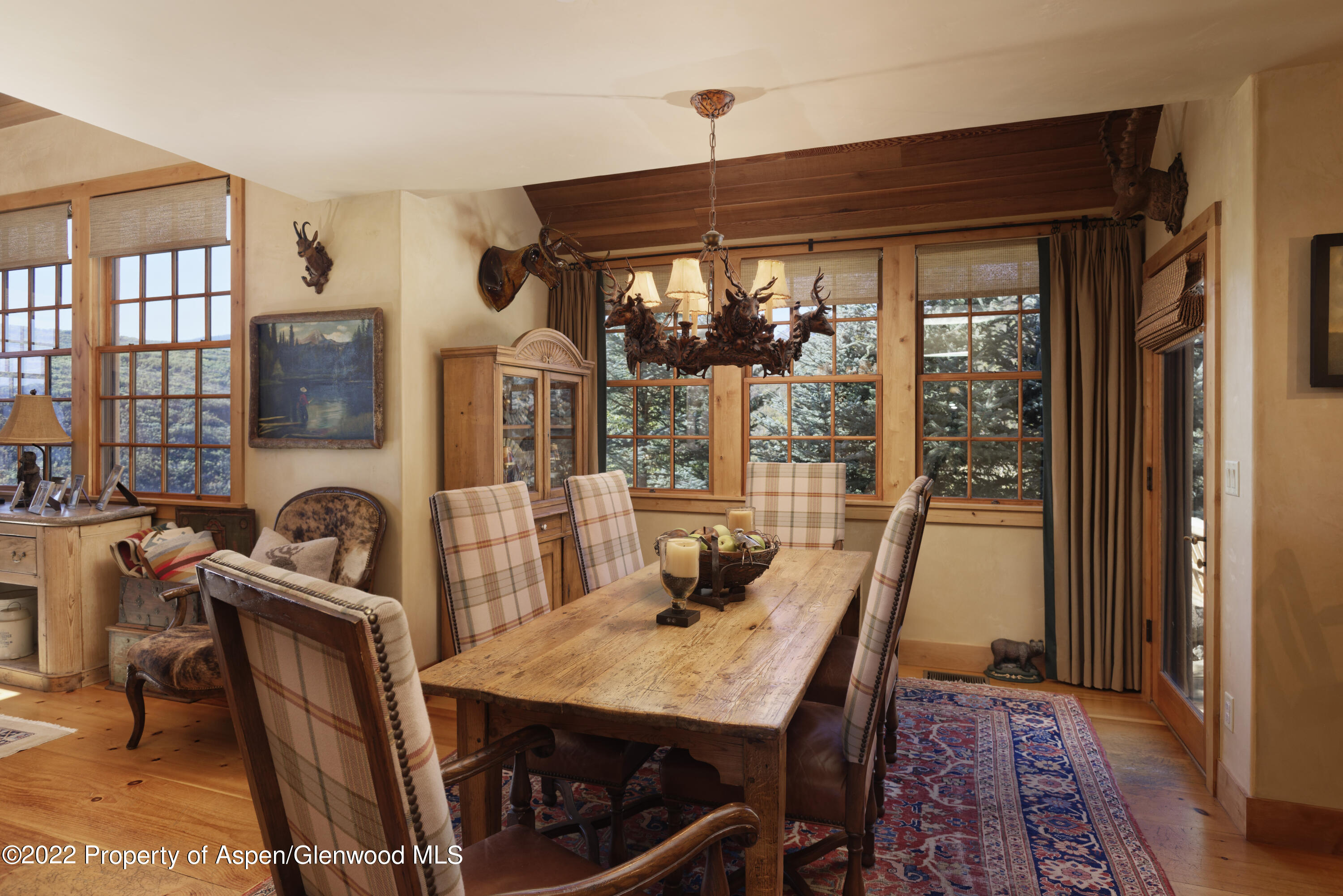 301 Stone Road Basalt, CO 81621 - Photo 11 of 45 a view of a dining room with furniture window and outside view