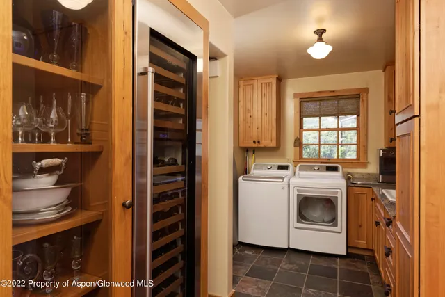 a kitchen with a stove and a refrigerator