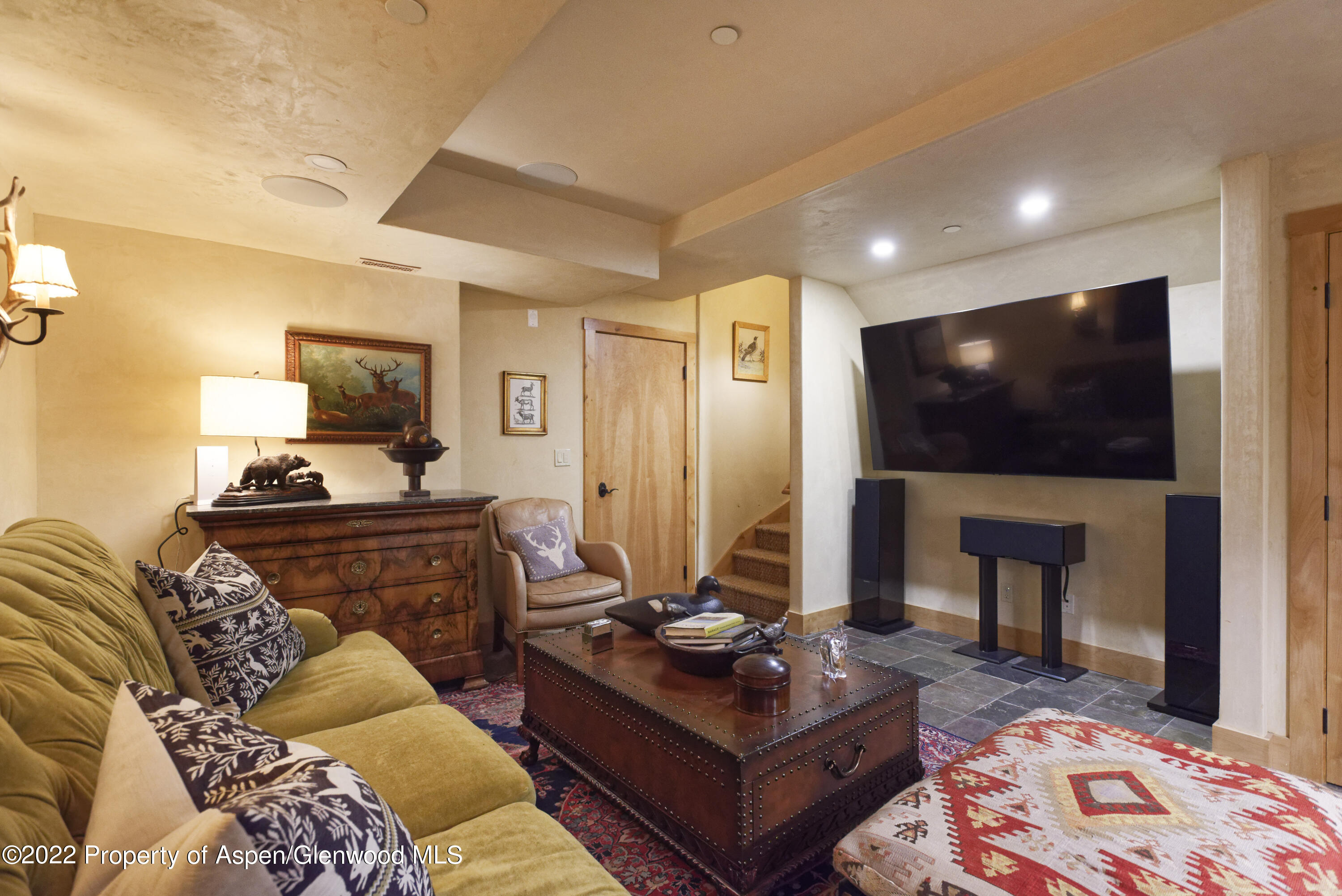 301 Stone Road Basalt, CO 81621 - Photo 18 of 45 a living room with furniture and a flat screen tv