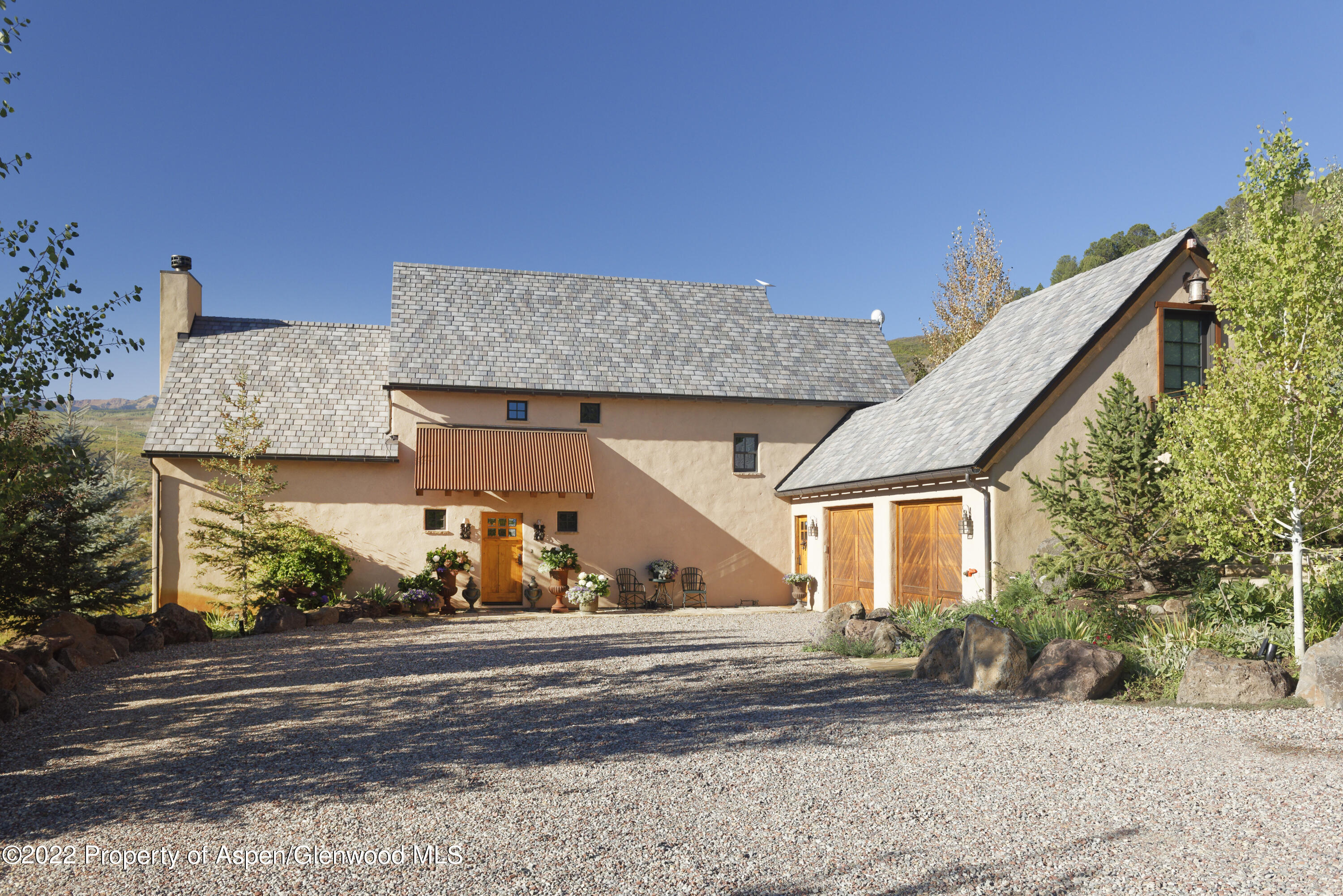 301 Stone Road Basalt, CO 81621 - Photo 2 of 45 a view of a house with a street