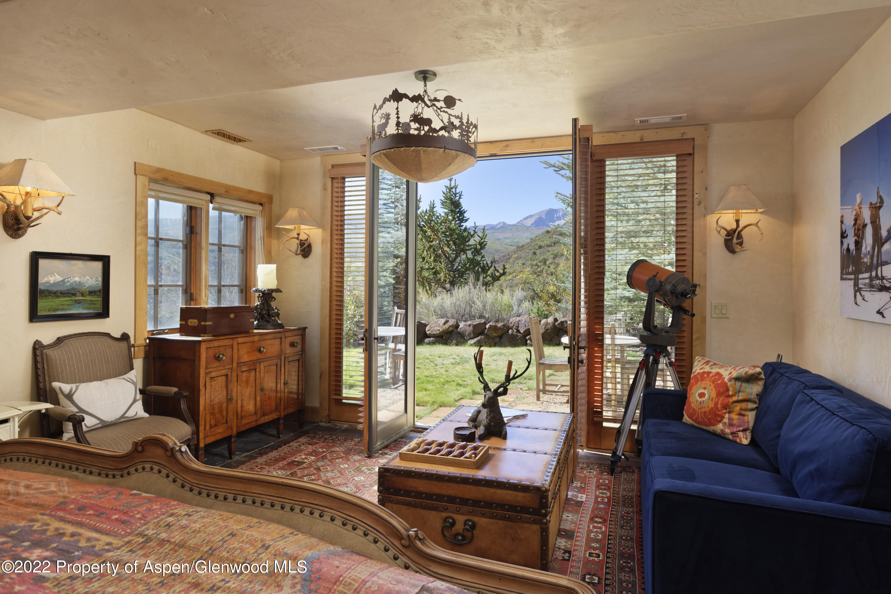 301 Stone Road Basalt, CO 81621 - Photo 25 of 45 a living room with furniture and a floor to ceiling window