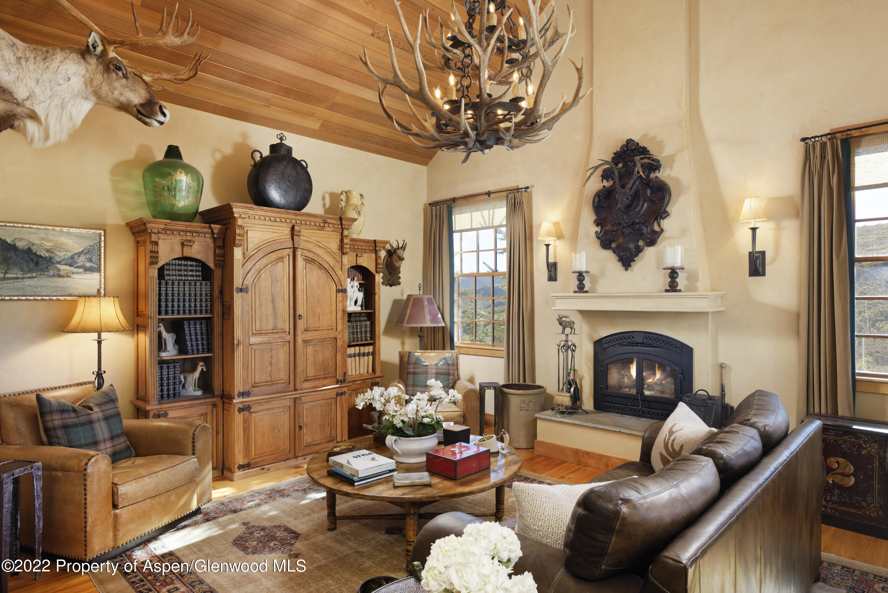 301 Stone Road Basalt, CO 81621 - Photo 5 of 45 a living room with furniture and a fireplace