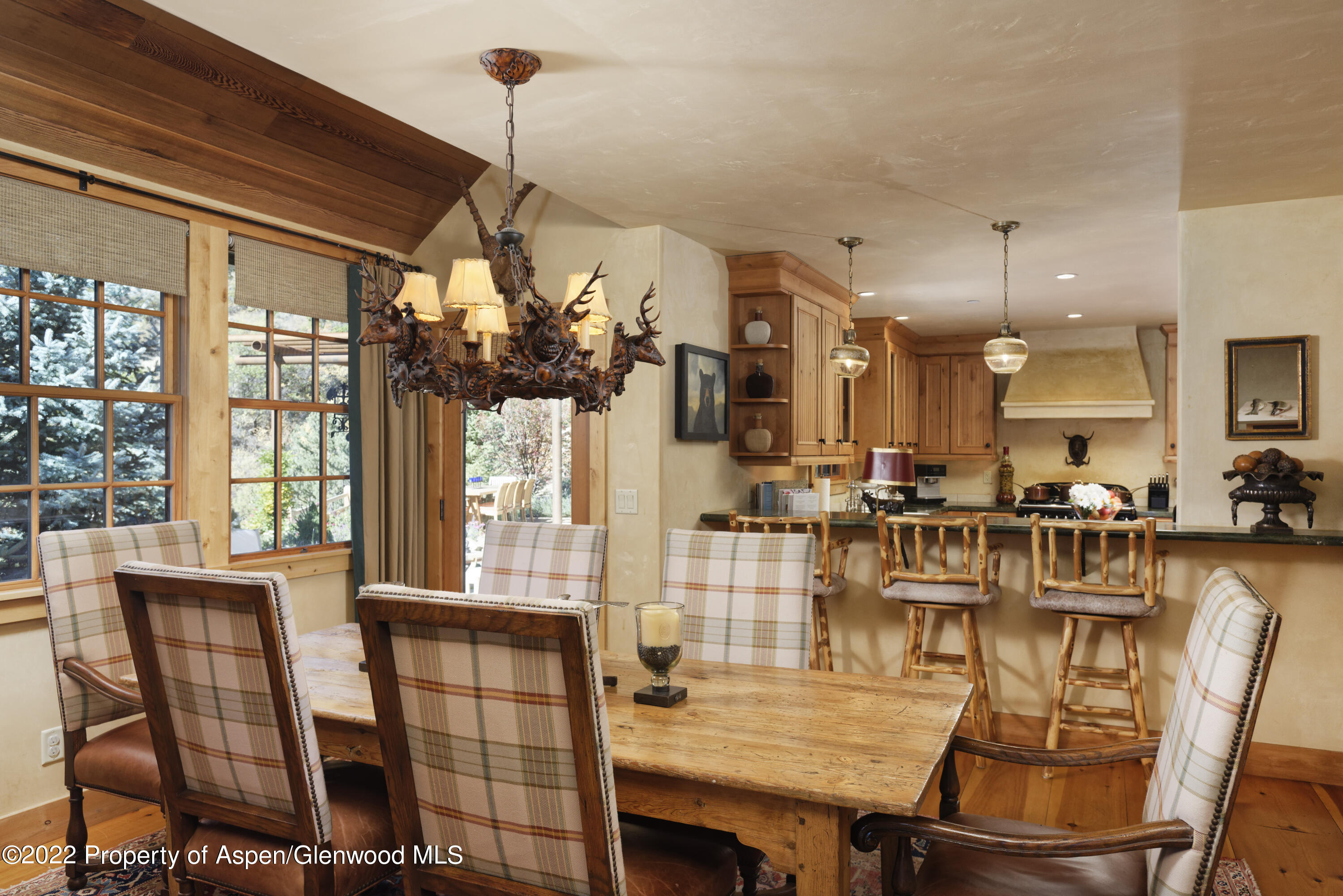 301 Stone Road Basalt, CO 81621 - Photo 10 of 45 a view of a dining room with furniture window and outside view