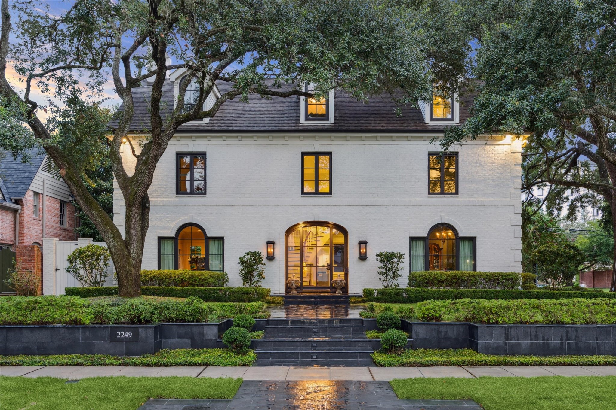 Extensively remodeled and thoughtfully expanded, the home combines timeless sophistication with impeccable, modern finishes throughout.