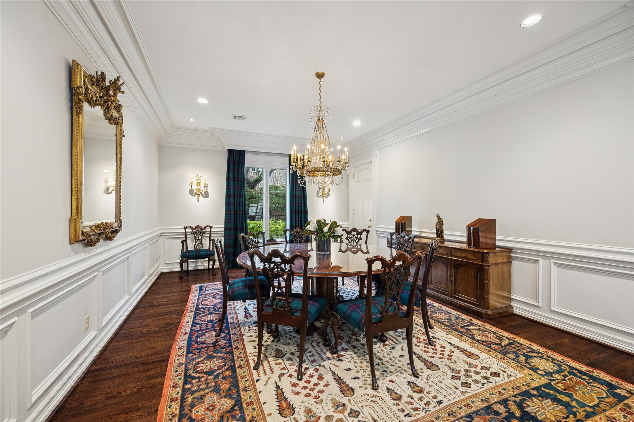 2249 Pelham Drive Houston, TX 77019 - Photo 16 of 50 Striking formal dining room with bold architectural lines, elegant lighting, and gracious proportions, ideal for hosting memorable dinners and celebrations.