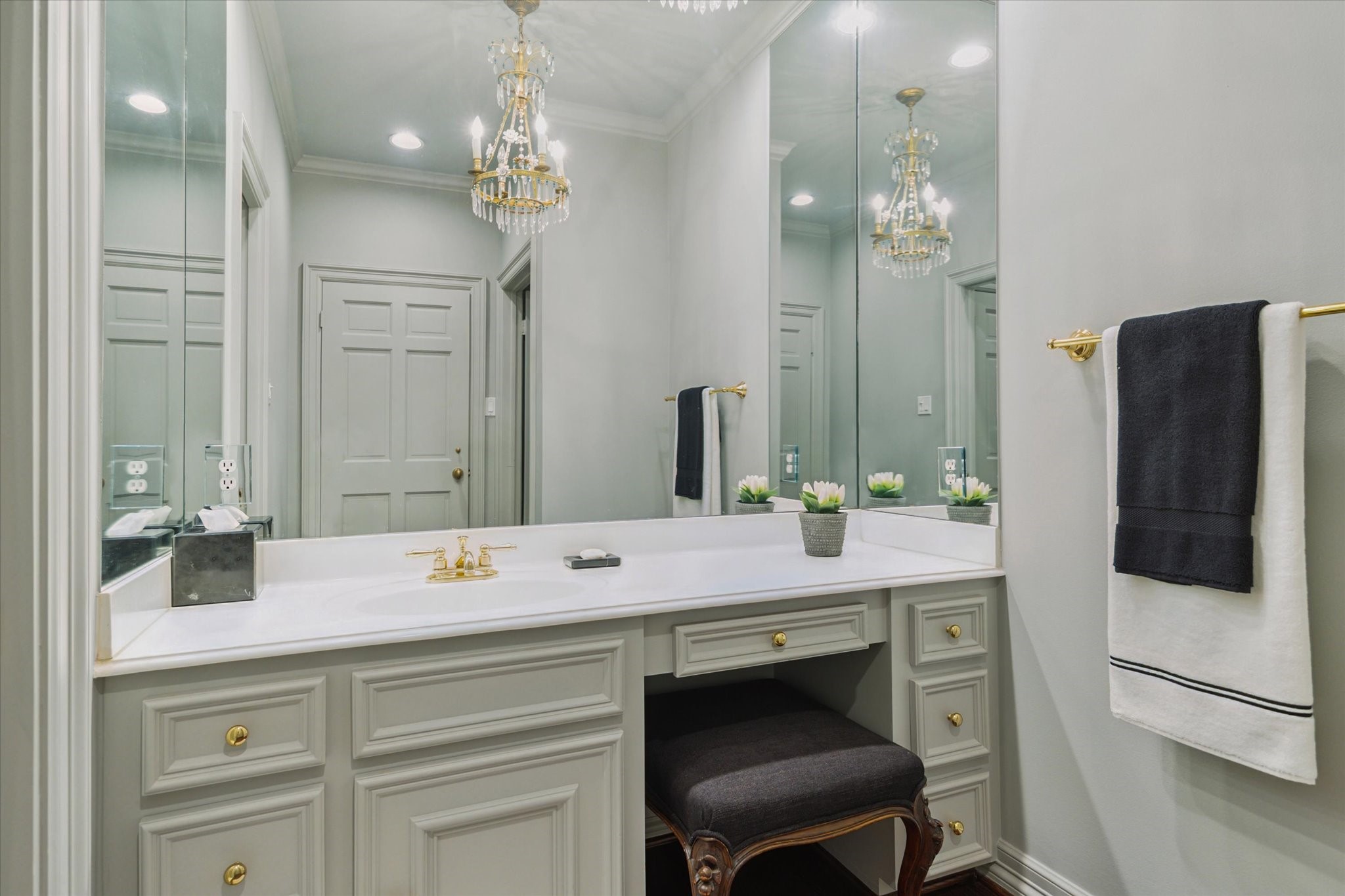 2249 Pelham Drive Houston, TX 77019 - Photo 35 of 50 Elegant dressing vanity with chandelier and custom cabinetry.