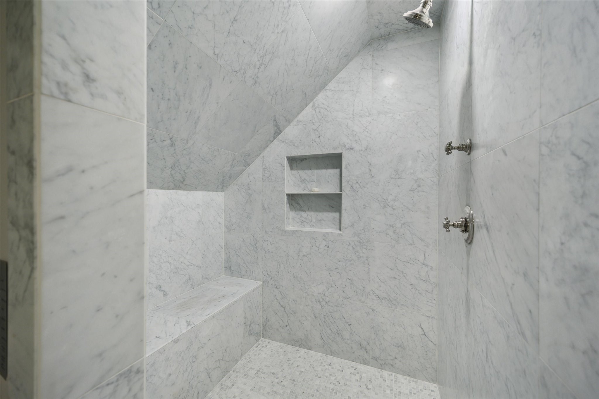 2249 Pelham Drive Houston, TX 77019 - Photo 44 of 50 Spa-inspired marble shower with built-in bench and niche.