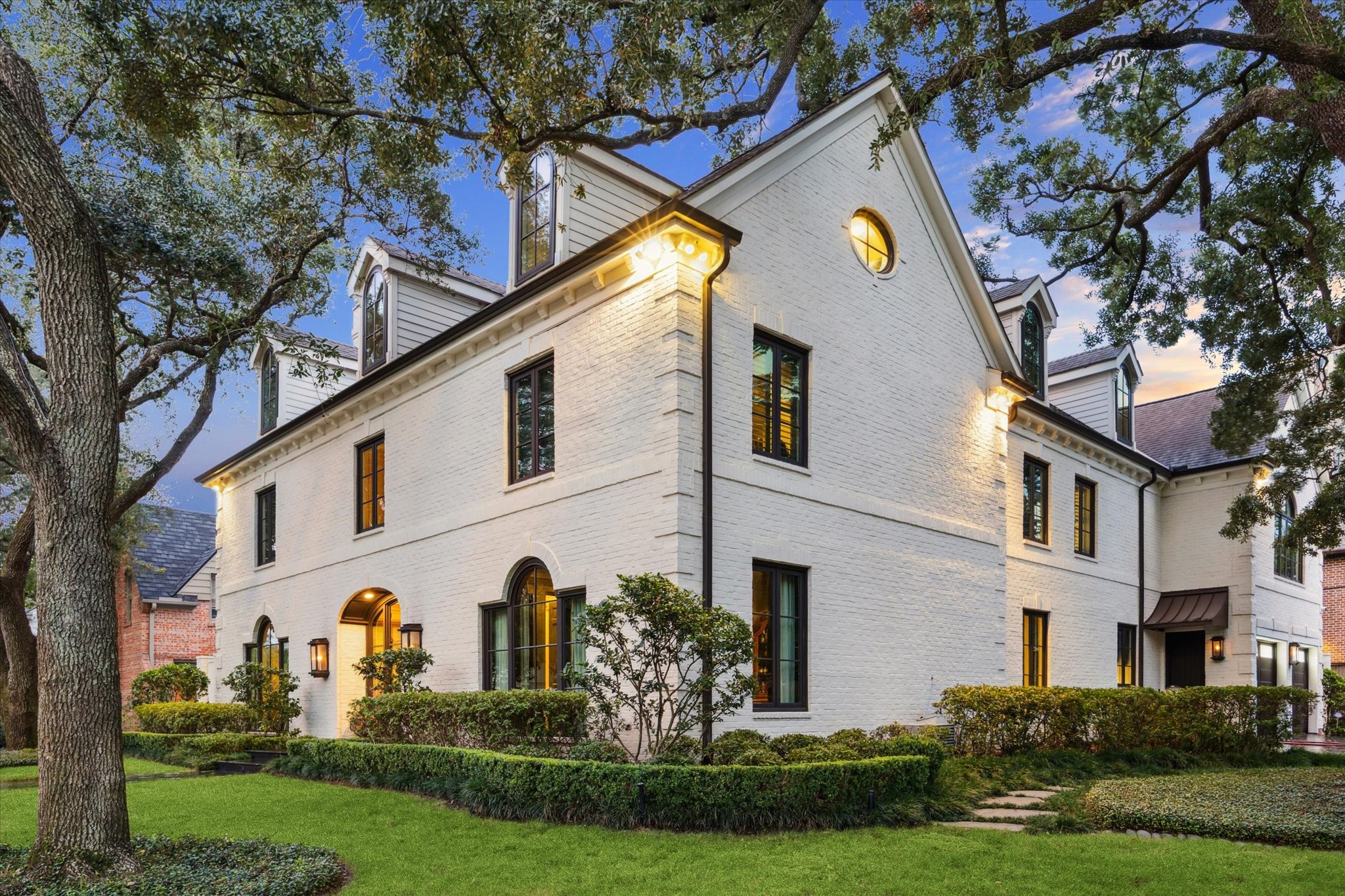 2249 Pelham Drive Houston, TX 77019 - Photo 50 of 50 Stately corner presence with manicured landscaping enhances the home’s timeless curb appeal.