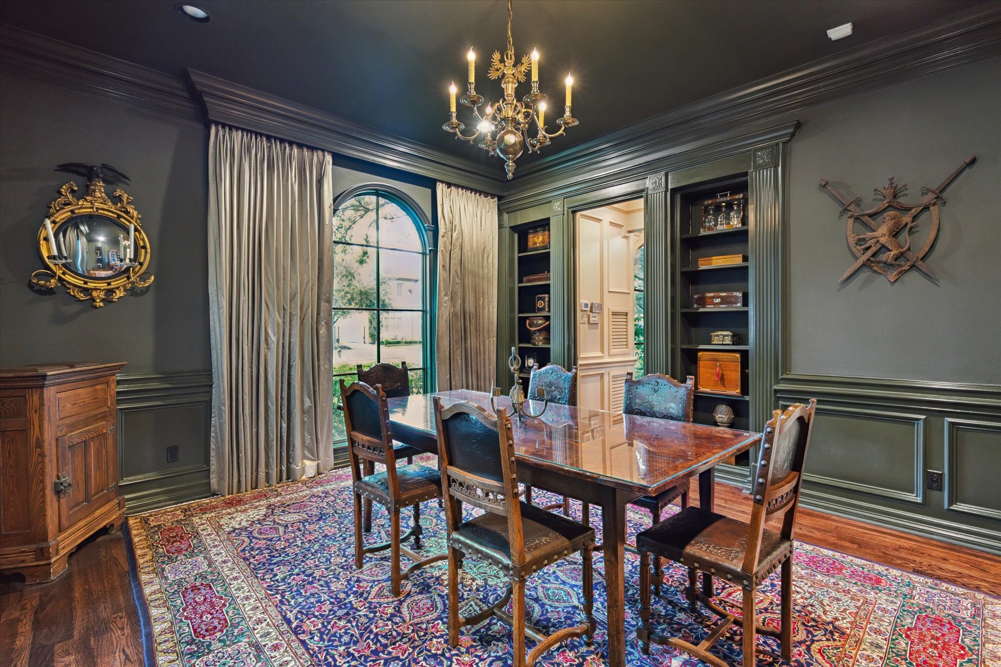 2249 Pelham Drive Houston, TX 77019 - Photo 9 of 50 Handsome paneled room with arched windows, perfect for library or intimate dining.