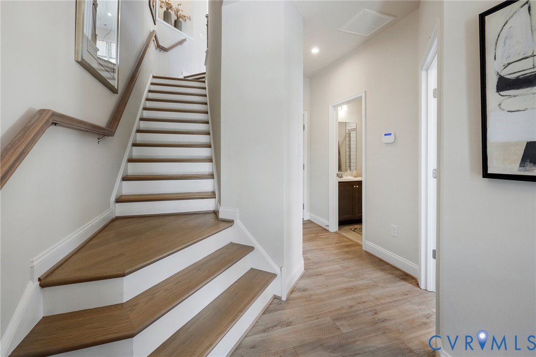16104 Esteem Way Midlothian, VA 23113 - Photo 3 of 38 a view of entryway and hall with wooden floor