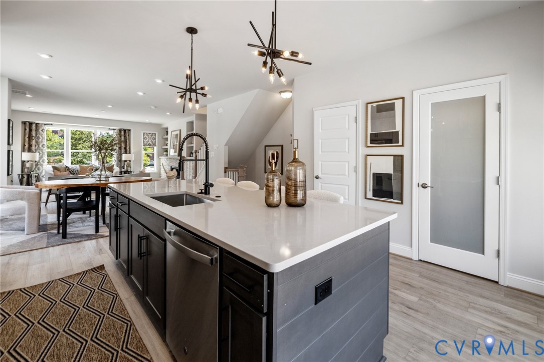 16104 Esteem Way Midlothian, VA 23113 - Photo 10 of 38 a kitchen with a sink and stove