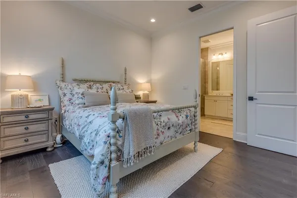 a bed room with a bed and a window