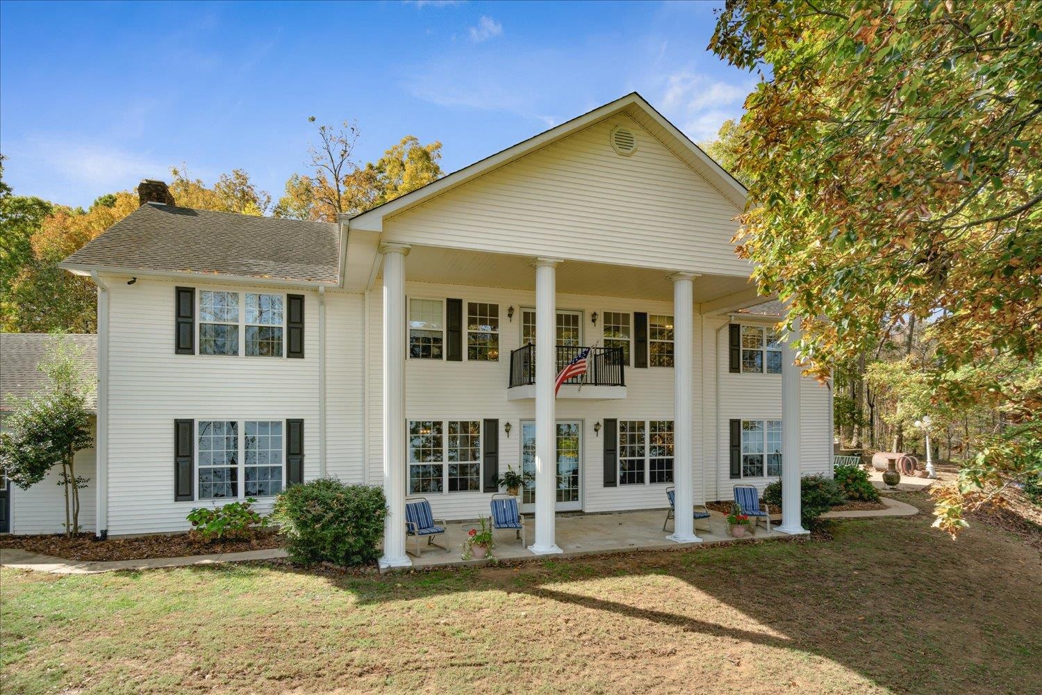 997 Vickers Road Big Sandy, TN 38221 - Photo 3 of 40 a view of a house with a swimming pool