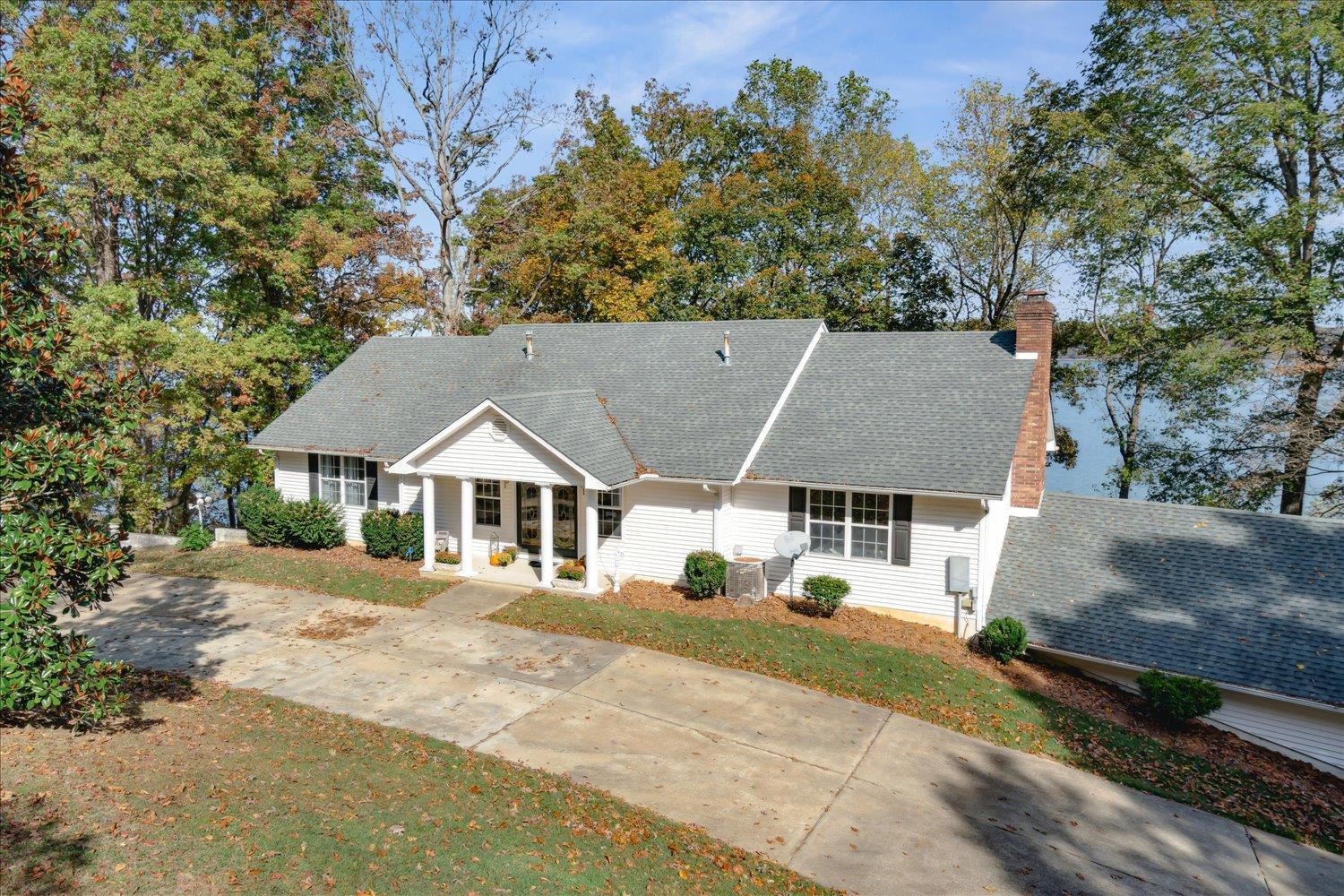 997 Vickers Road Big Sandy, TN 38221 - Photo 39 of 40 front view of a house with a patio