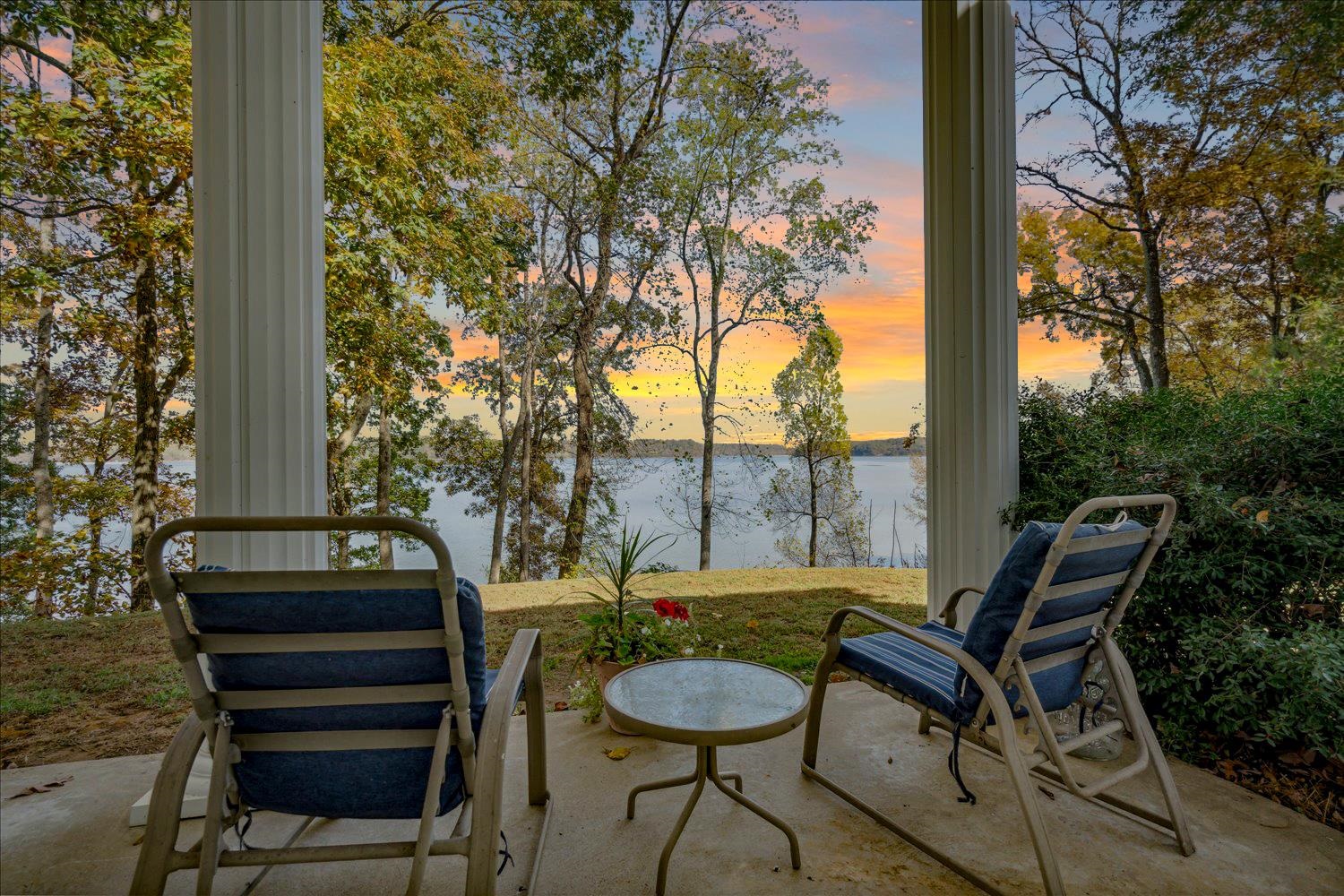 997 Vickers Road Big Sandy, TN 38221 - Photo 4 of 40 a view of a outdoor sitting area with furniture and wooden deck