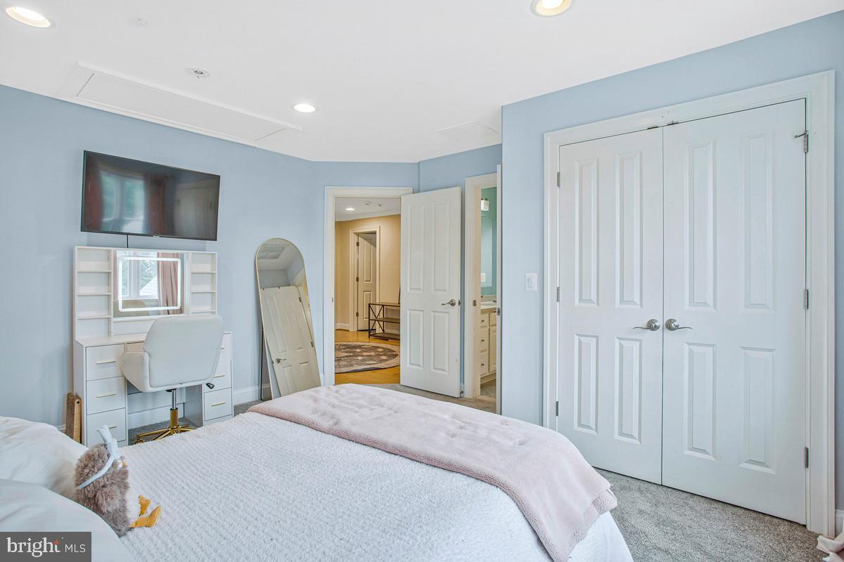 5 Jessie Road Harwood, MD 20776 - Photo 46 of 87 a bedroom with a bed and a television