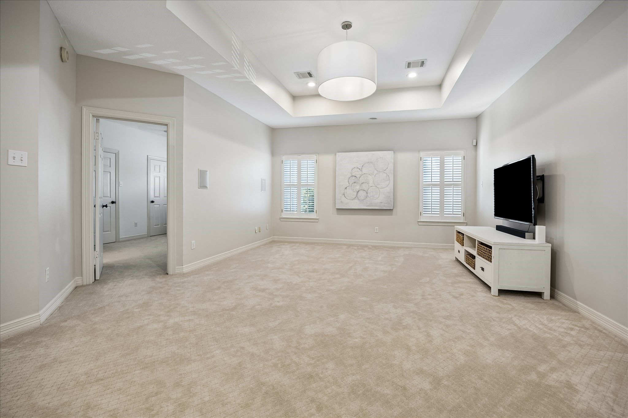4131 Sunset Boulevard Houston, TX 77005 - Photo 24 of 38 a view of livingroom with flat screen tv and windows