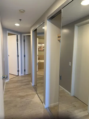 a view of hallway with shower