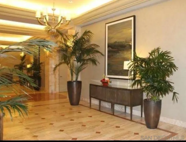 a potted plant sitting in front of a house