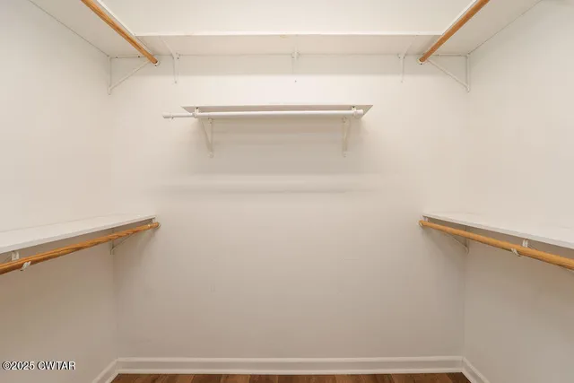 a view of small space with racks on the wall