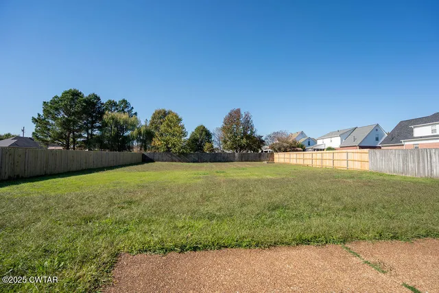 a view of outdoor space and yard