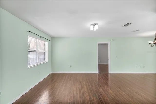 a kitchen with stainless steel appliances a refrigerator sink and stove