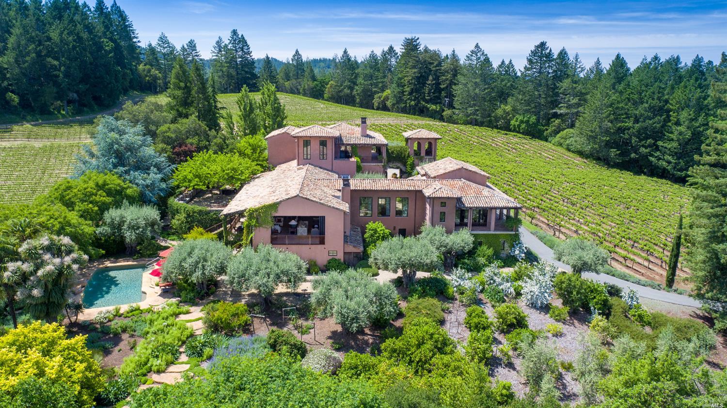 5800 Petrified Forest Road Calistoga, CA 94515 - Photo 1 of 1 view of a house with a yard and trees in the background